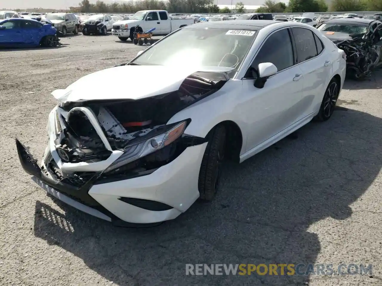 2 Photograph of a damaged car 4T1B61HK0KU738293 TOYOTA CAMRY 2019