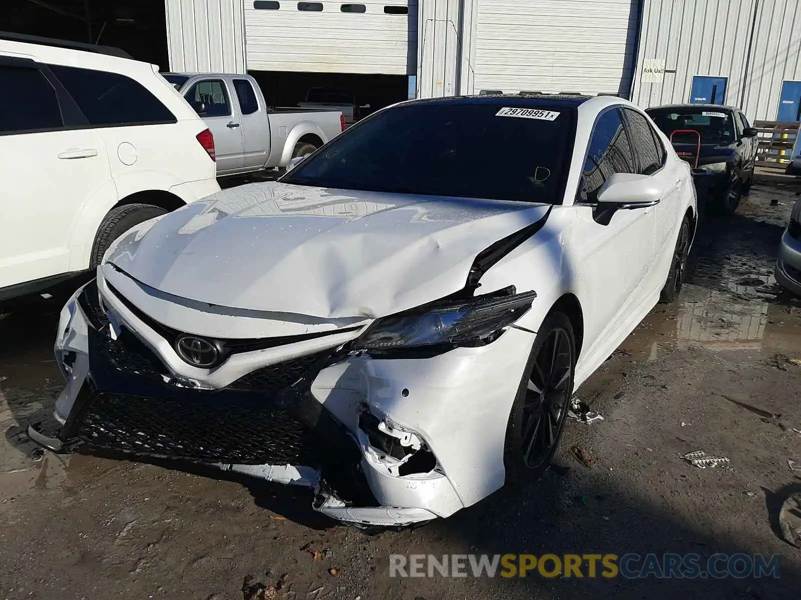 2 Photograph of a damaged car 4T1B61HK0KU768667 TOYOTA CAMRY 2019