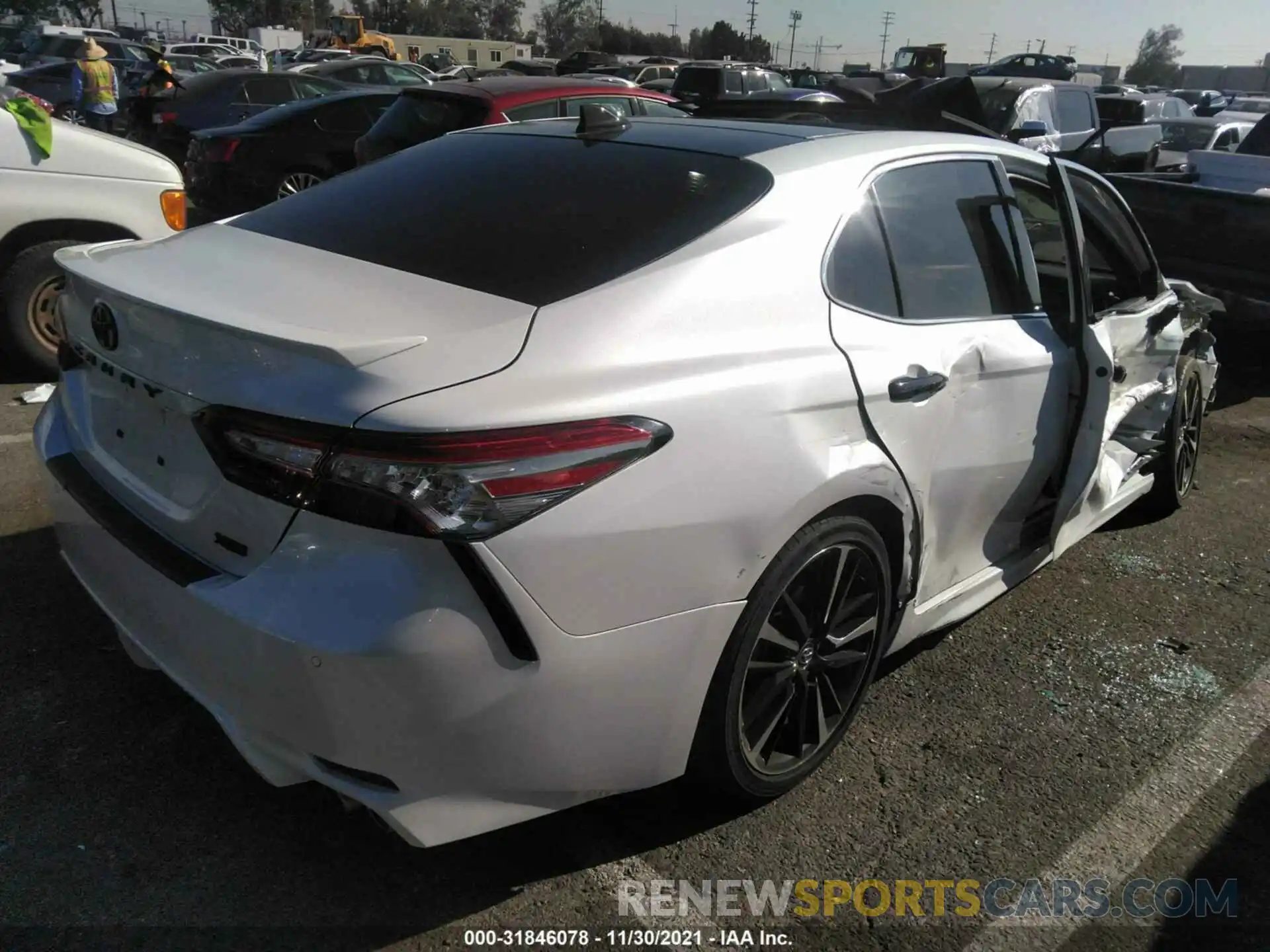 4 Photograph of a damaged car 4T1B61HK0KU789499 TOYOTA CAMRY 2019