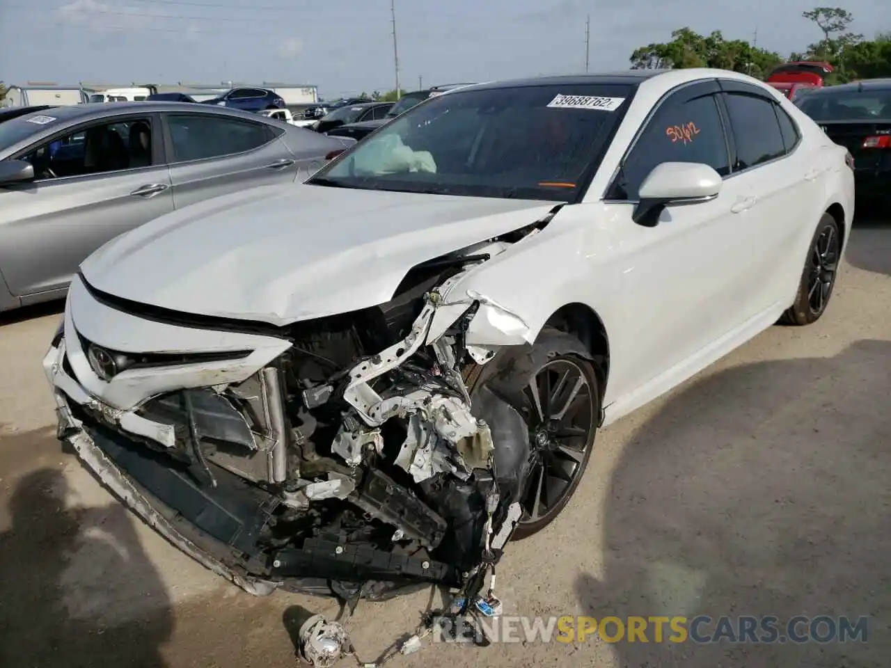 2 Photograph of a damaged car 4T1B61HK0KU790961 TOYOTA CAMRY 2019