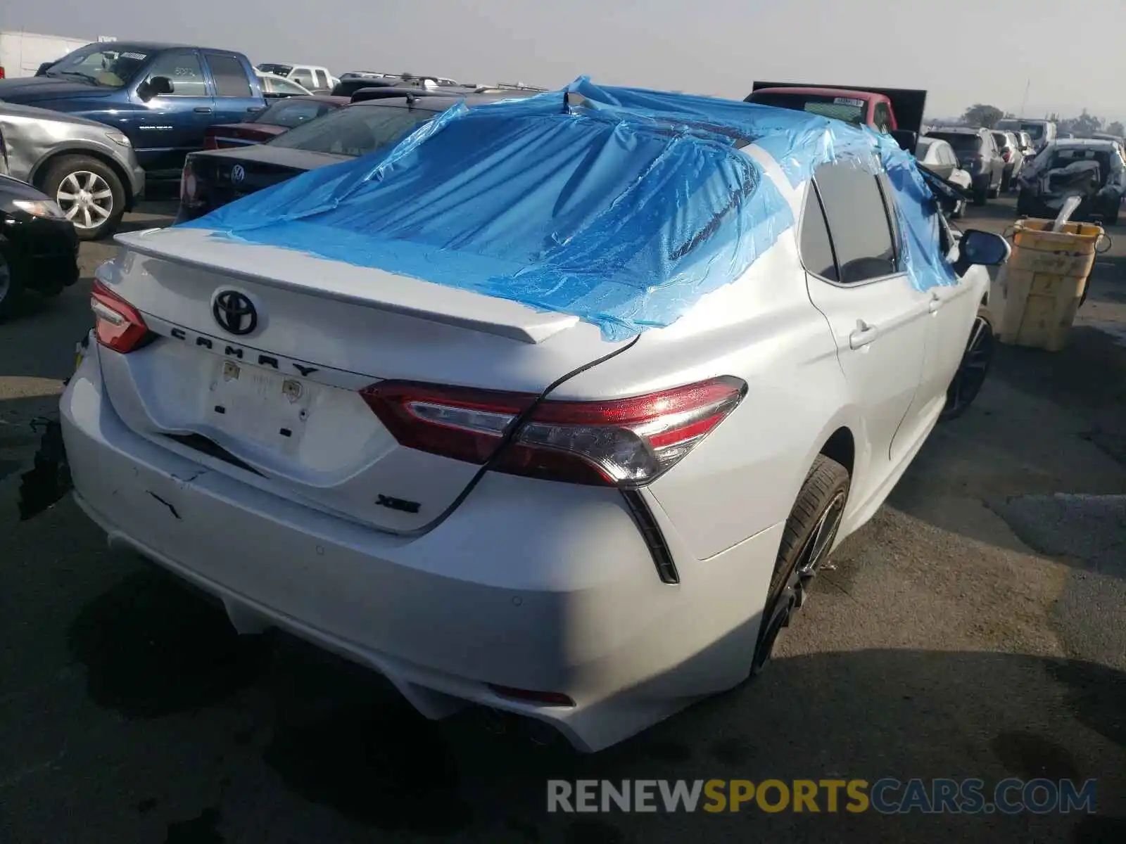 4 Photograph of a damaged car 4T1B61HK0KU794072 TOYOTA CAMRY 2019