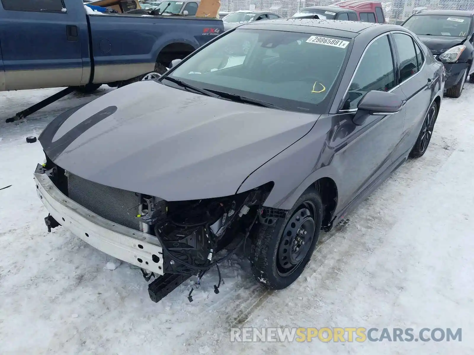 2 Photograph of a damaged car 4T1B61HK0KU818922 TOYOTA CAMRY 2019