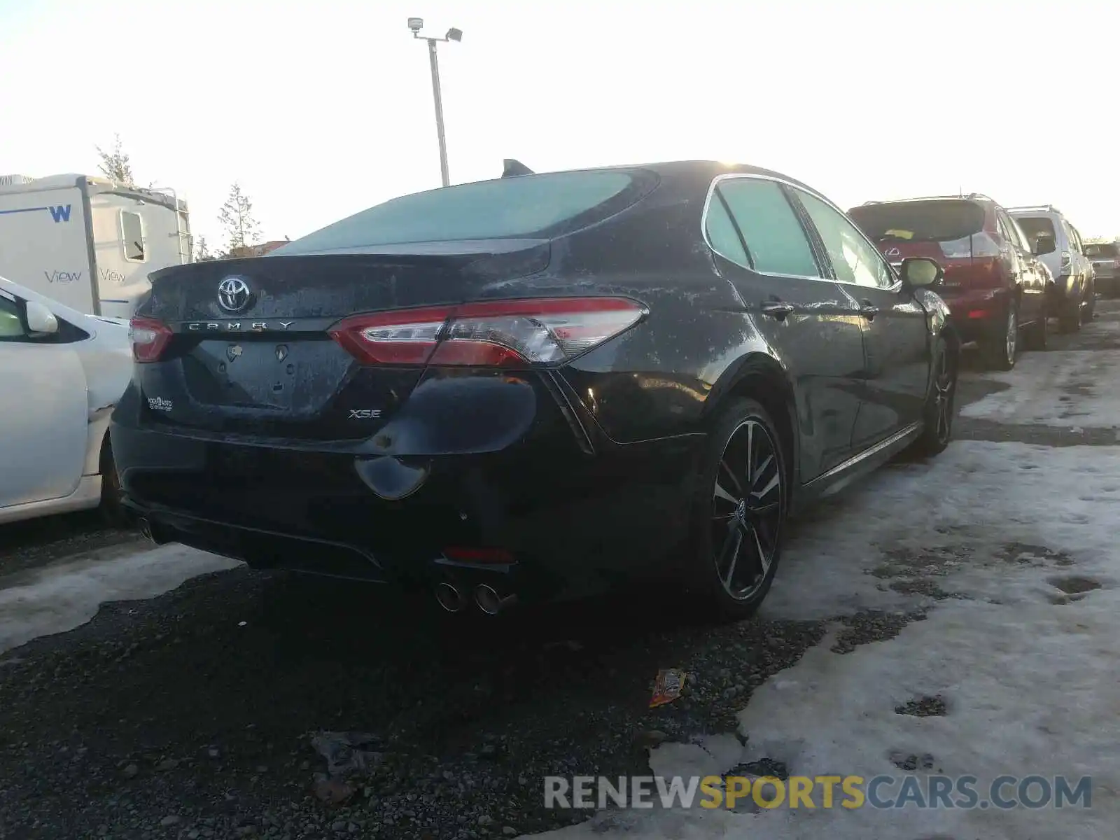 4 Photograph of a damaged car 4T1B61HK0KU844128 TOYOTA CAMRY 2019