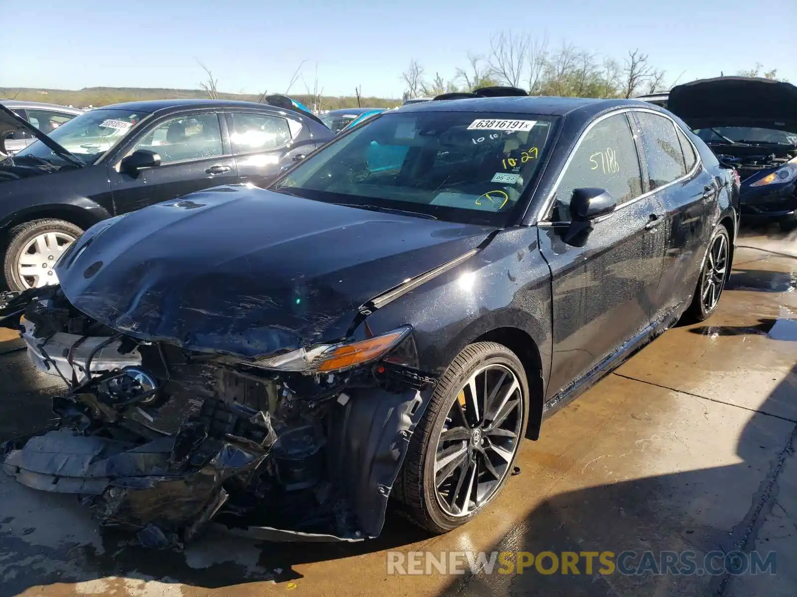 2 Photograph of a damaged car 4T1B61HK1KU169809 TOYOTA CAMRY 2019