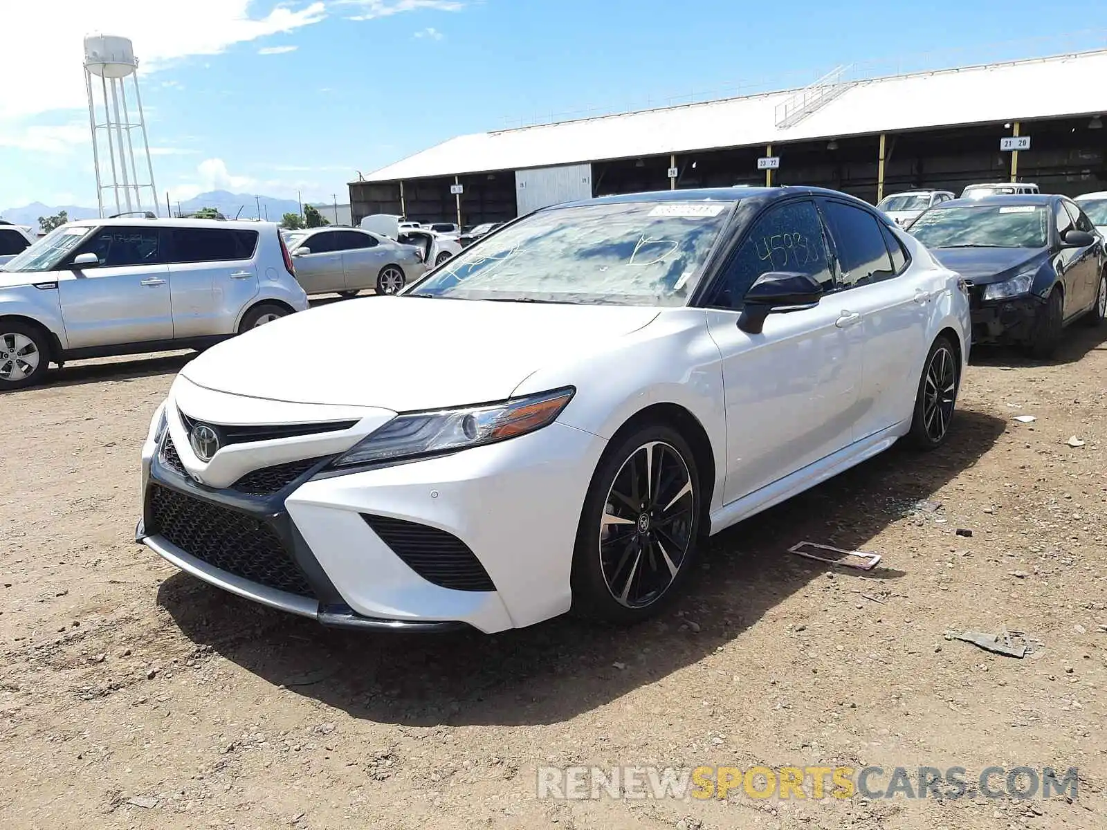 2 Photograph of a damaged car 4T1B61HK1KU220466 TOYOTA CAMRY 2019