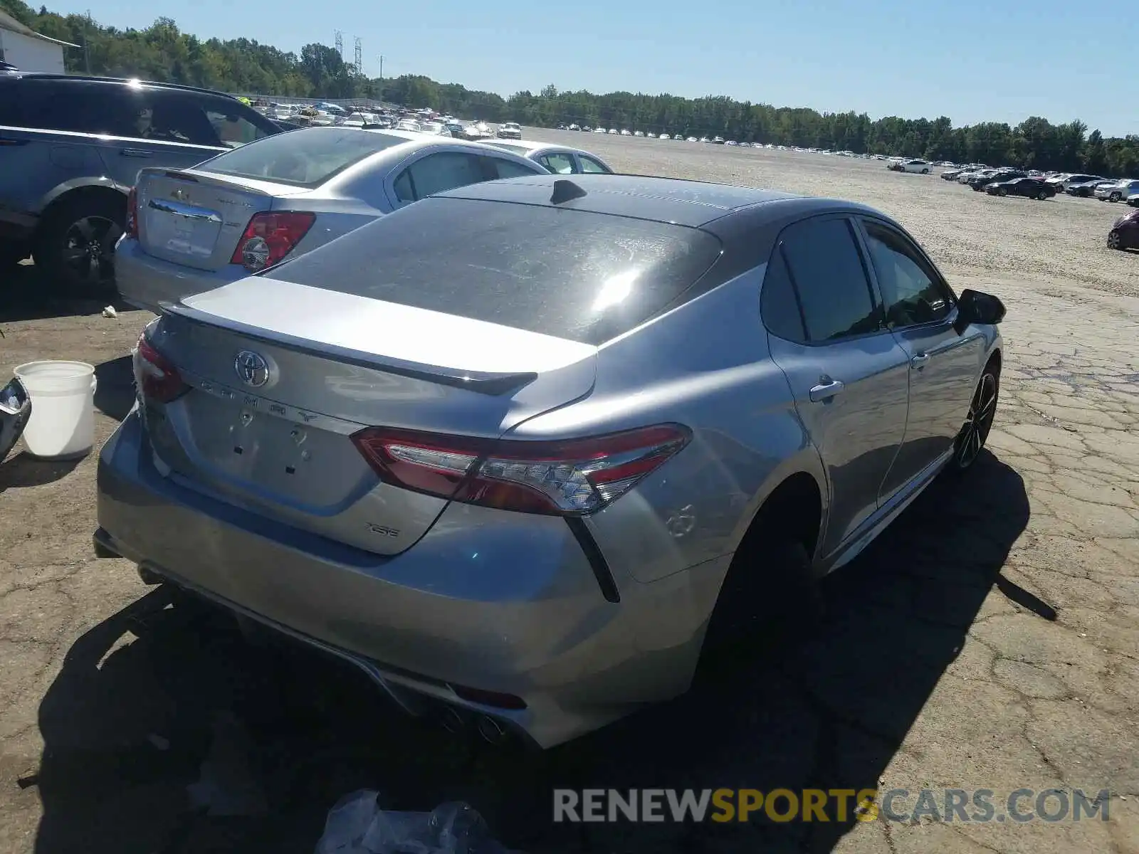 4 Photograph of a damaged car 4T1B61HK1KU229149 TOYOTA CAMRY 2019