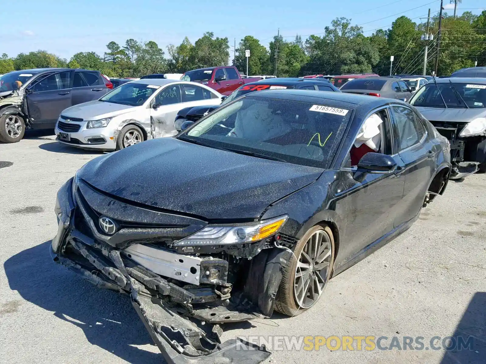 2 Photograph of a damaged car 4T1B61HK1KU242094 TOYOTA CAMRY 2019