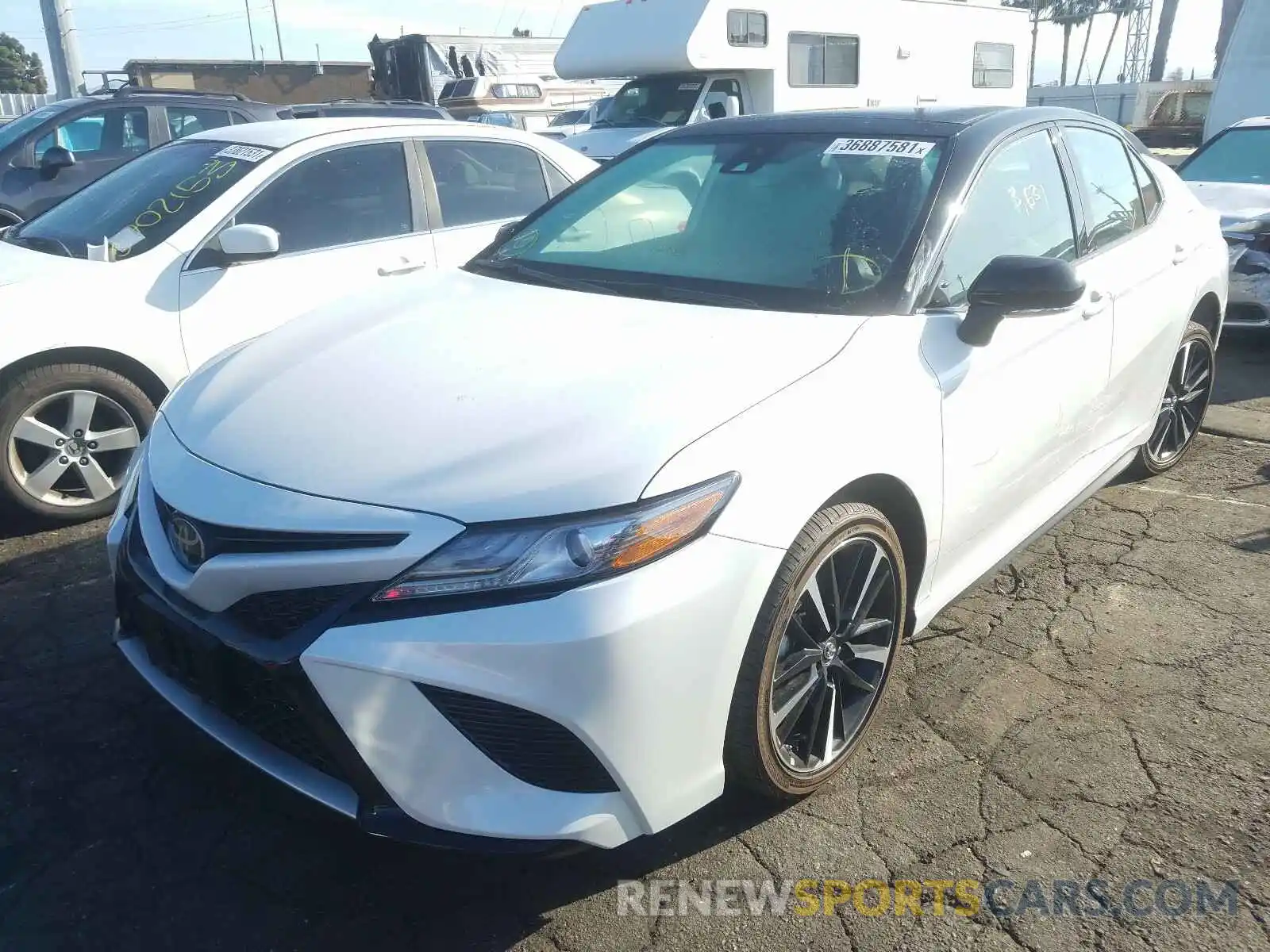 2 Photograph of a damaged car 4T1B61HK1KU292106 TOYOTA CAMRY 2019