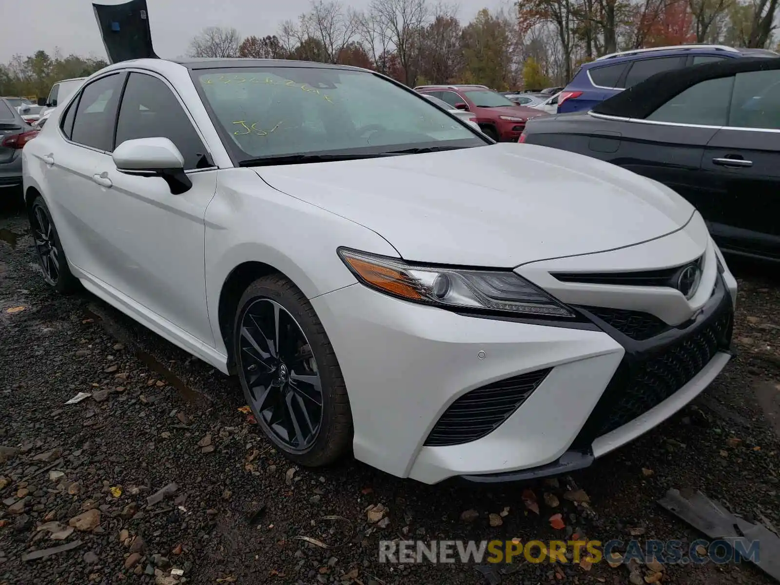 1 Photograph of a damaged car 4T1B61HK1KU697933 TOYOTA CAMRY 2019