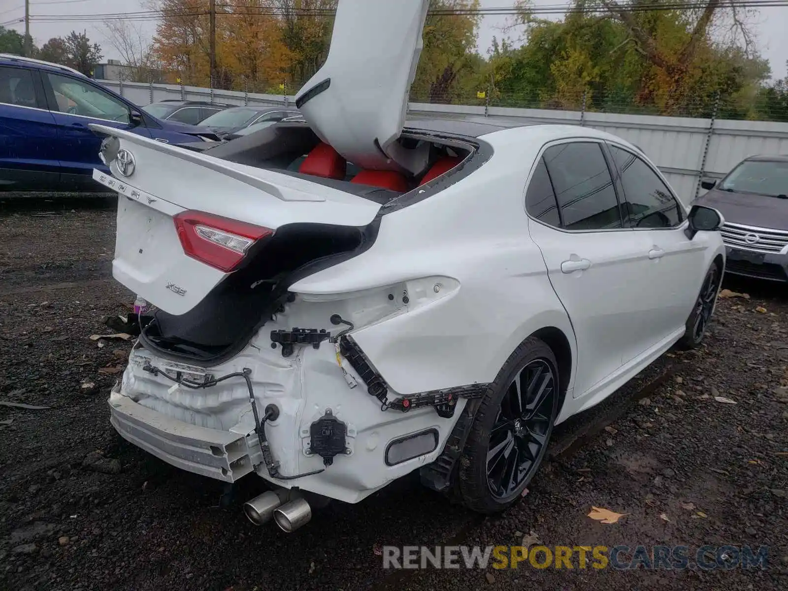 4 Photograph of a damaged car 4T1B61HK1KU697933 TOYOTA CAMRY 2019