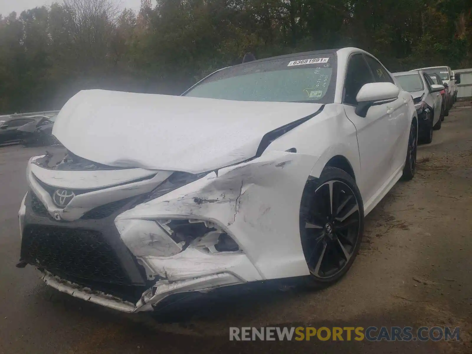 2 Photograph of a damaged car 4T1B61HK1KU709028 TOYOTA CAMRY 2019