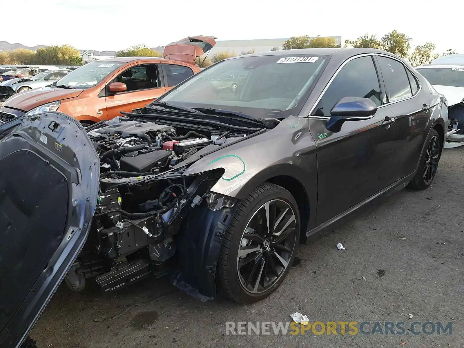 2 Photograph of a damaged car 4T1B61HK1KU761792 TOYOTA CAMRY 2019