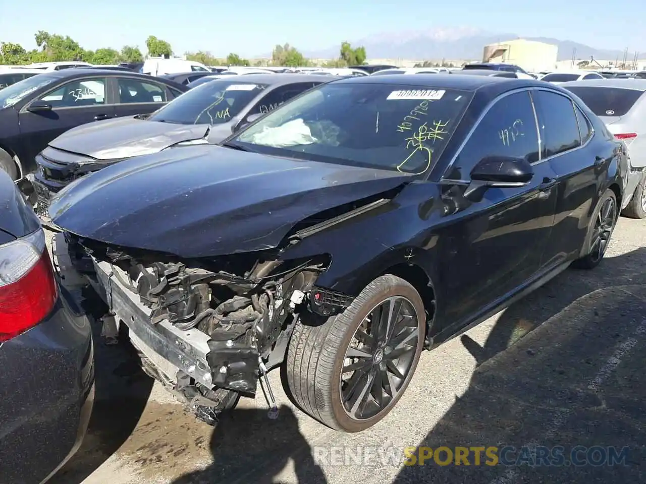 2 Photograph of a damaged car 4T1B61HK1KU772386 TOYOTA CAMRY 2019