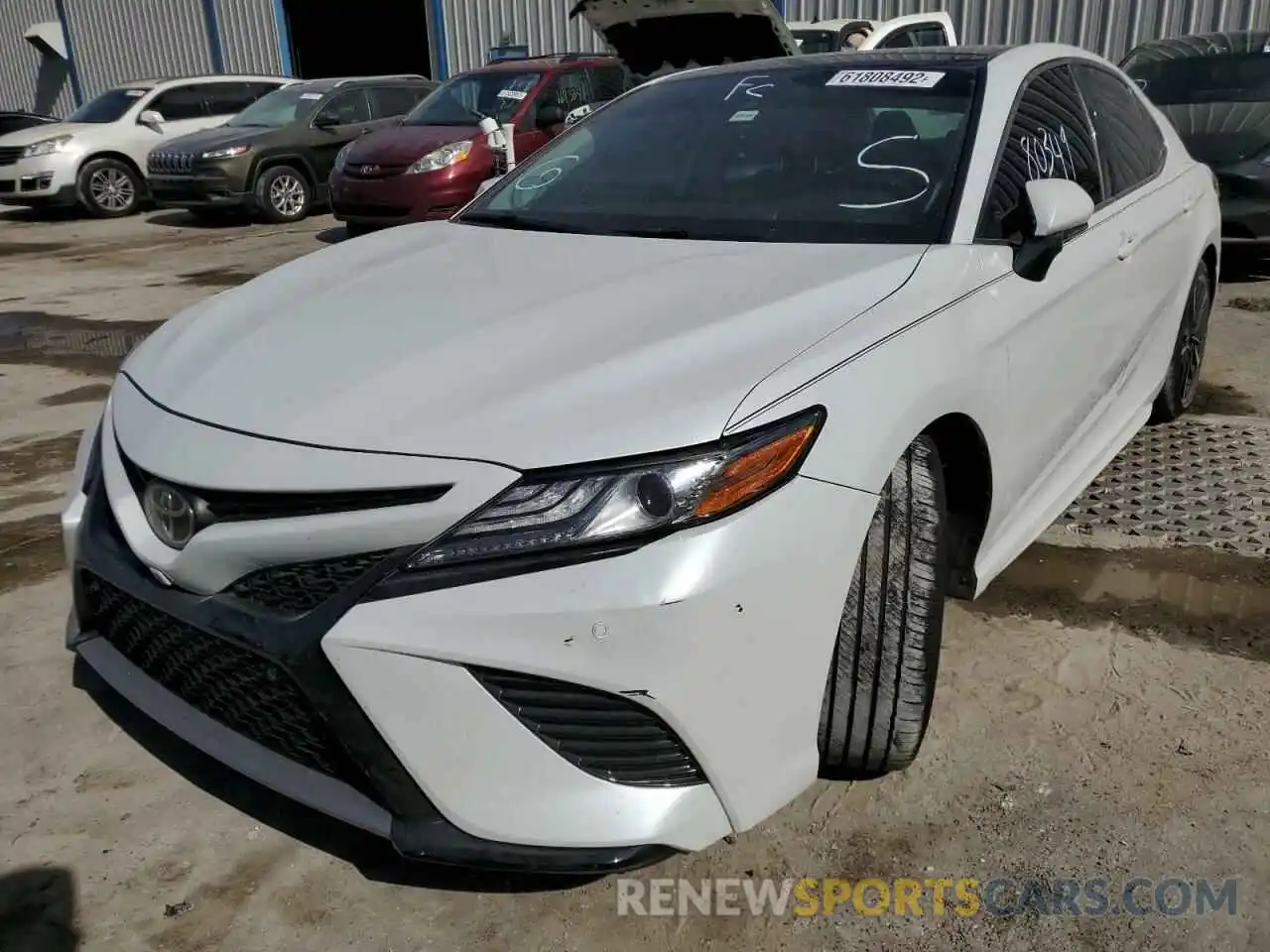 2 Photograph of a damaged car 4T1B61HK1KU822879 TOYOTA CAMRY 2019