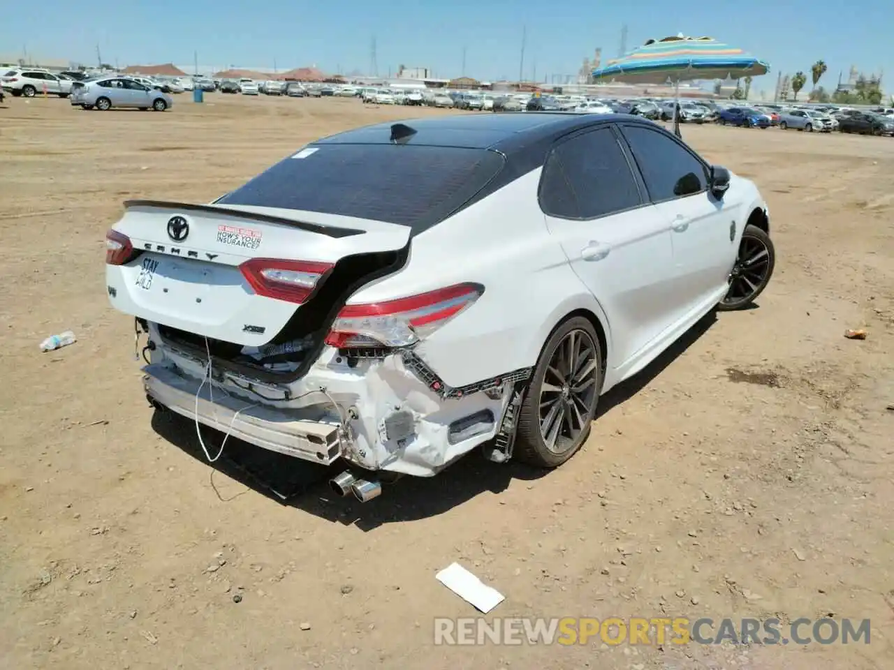 4 Photograph of a damaged car 4T1B61HK2KU215695 TOYOTA CAMRY 2019