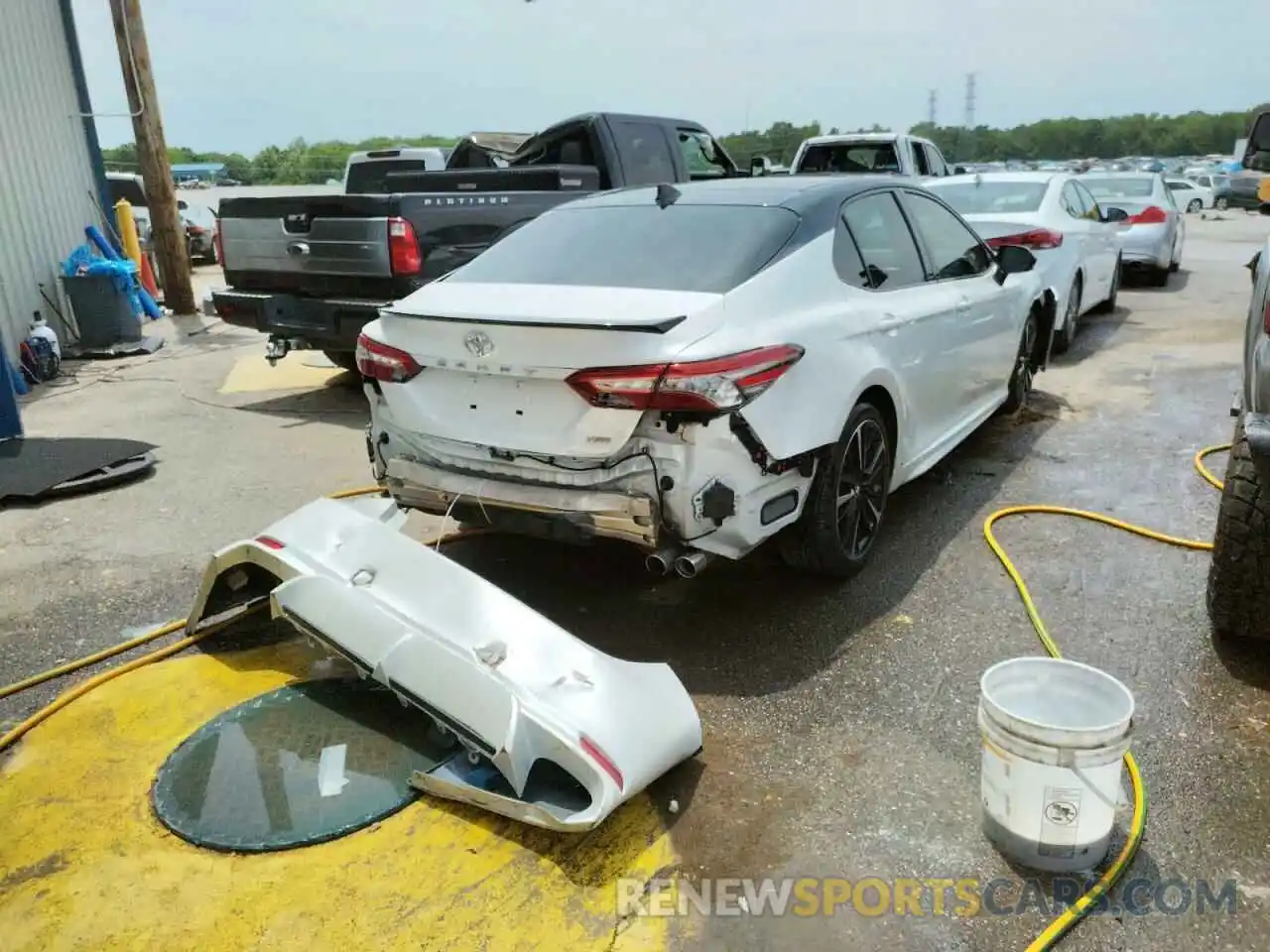 4 Photograph of a damaged car 4T1B61HK2KU217799 TOYOTA CAMRY 2019