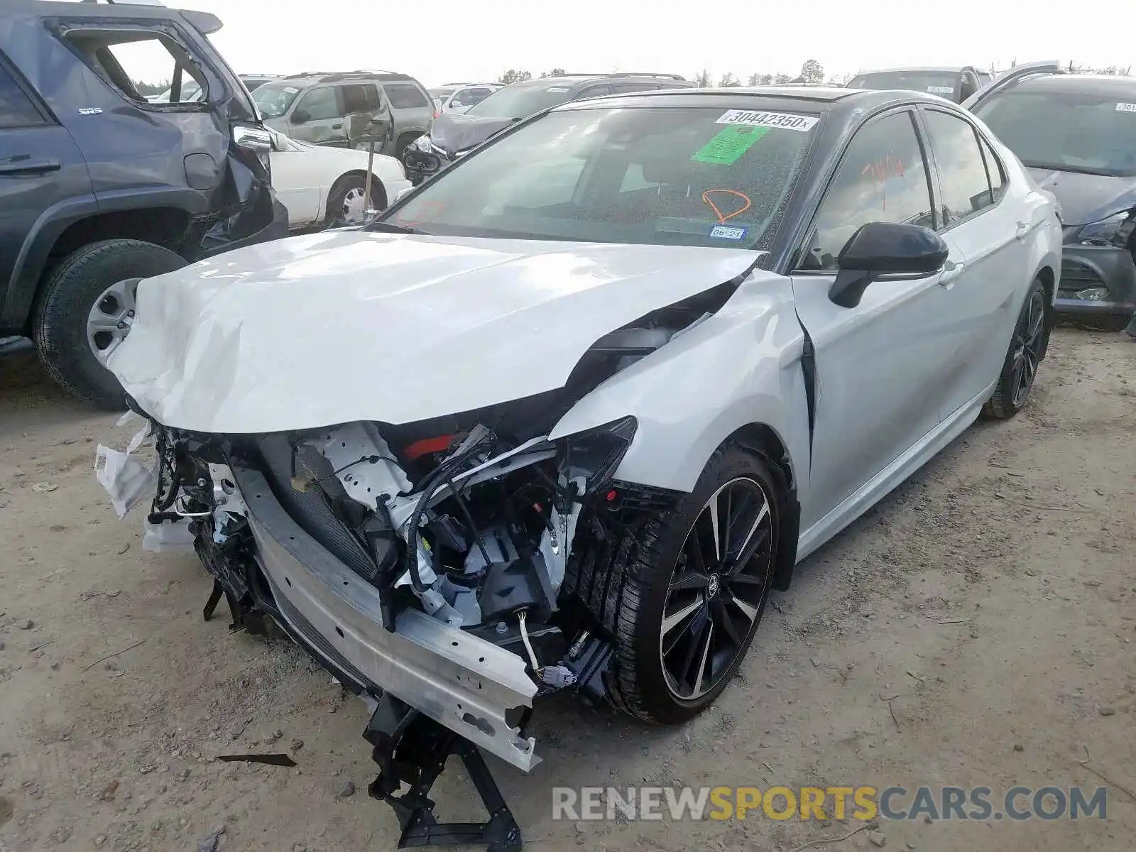 2 Photograph of a damaged car 4T1B61HK2KU263682 TOYOTA CAMRY 2019