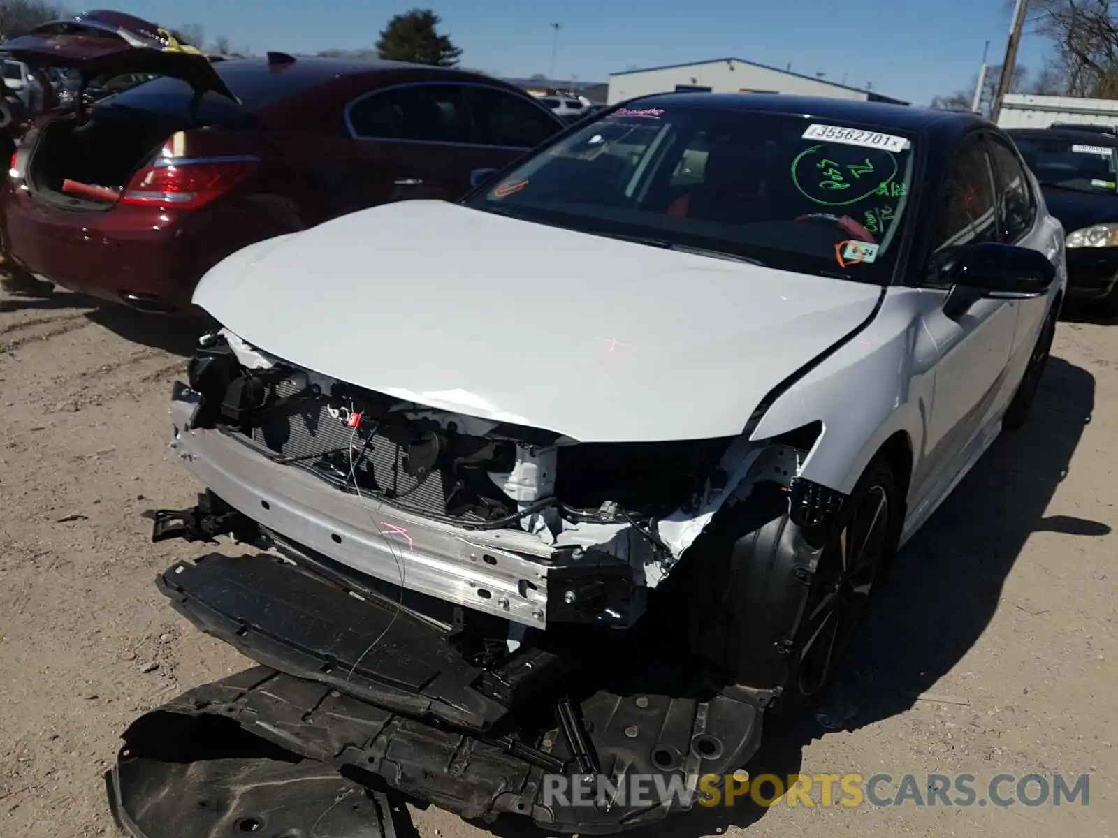 2 Photograph of a damaged car 4T1B61HK2KU274567 TOYOTA CAMRY 2019