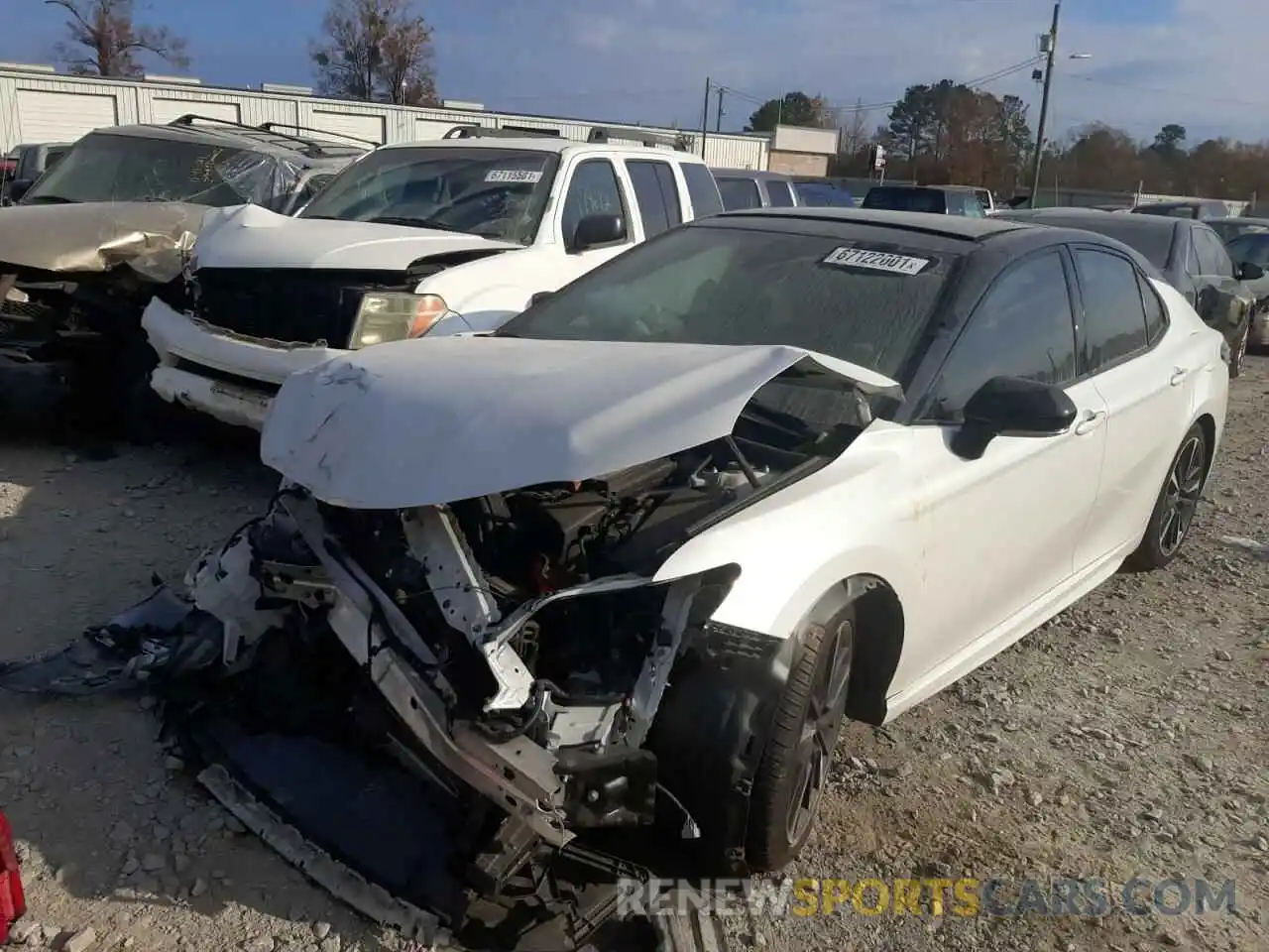 2 Photograph of a damaged car 4T1B61HK2KU295063 TOYOTA CAMRY 2019