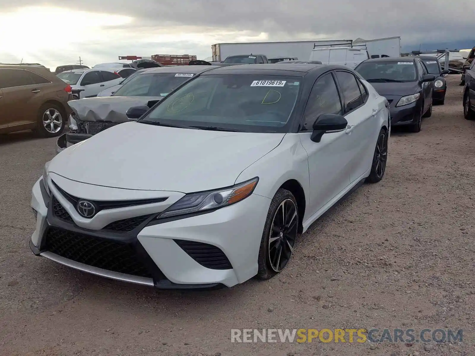 2 Photograph of a damaged car 4T1B61HK2KU299873 TOYOTA CAMRY 2019