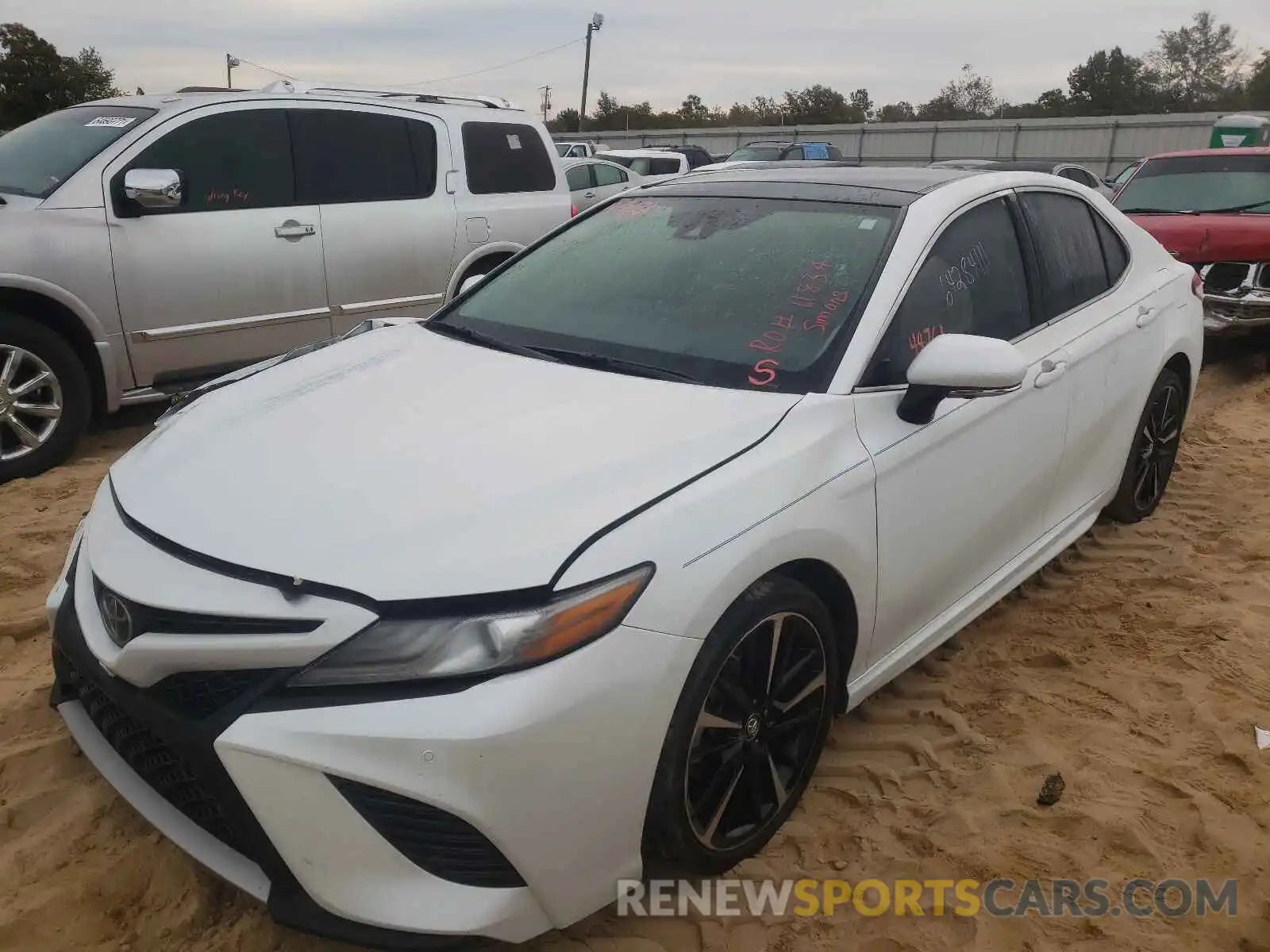 2 Photograph of a damaged car 4T1B61HK2KU692692 TOYOTA CAMRY 2019