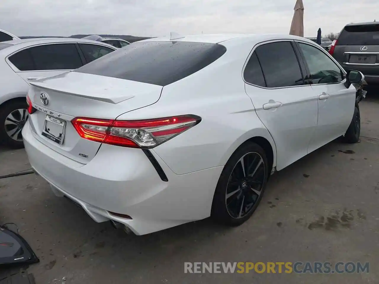 4 Photograph of a damaged car 4T1B61HK2KU693731 TOYOTA CAMRY 2019