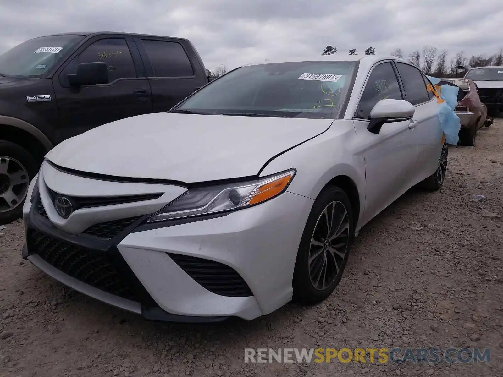 2 Photograph of a damaged car 4T1B61HK2KU736805 TOYOTA CAMRY 2019