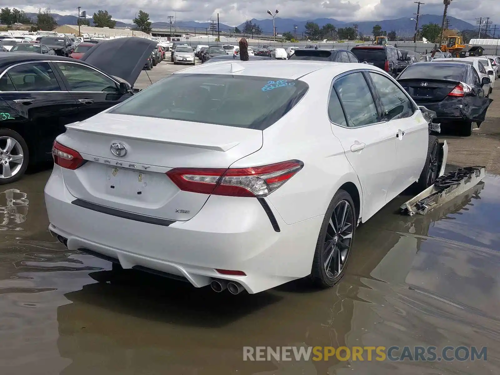 4 Photograph of a damaged car 4T1B61HK2KU800650 TOYOTA CAMRY 2019