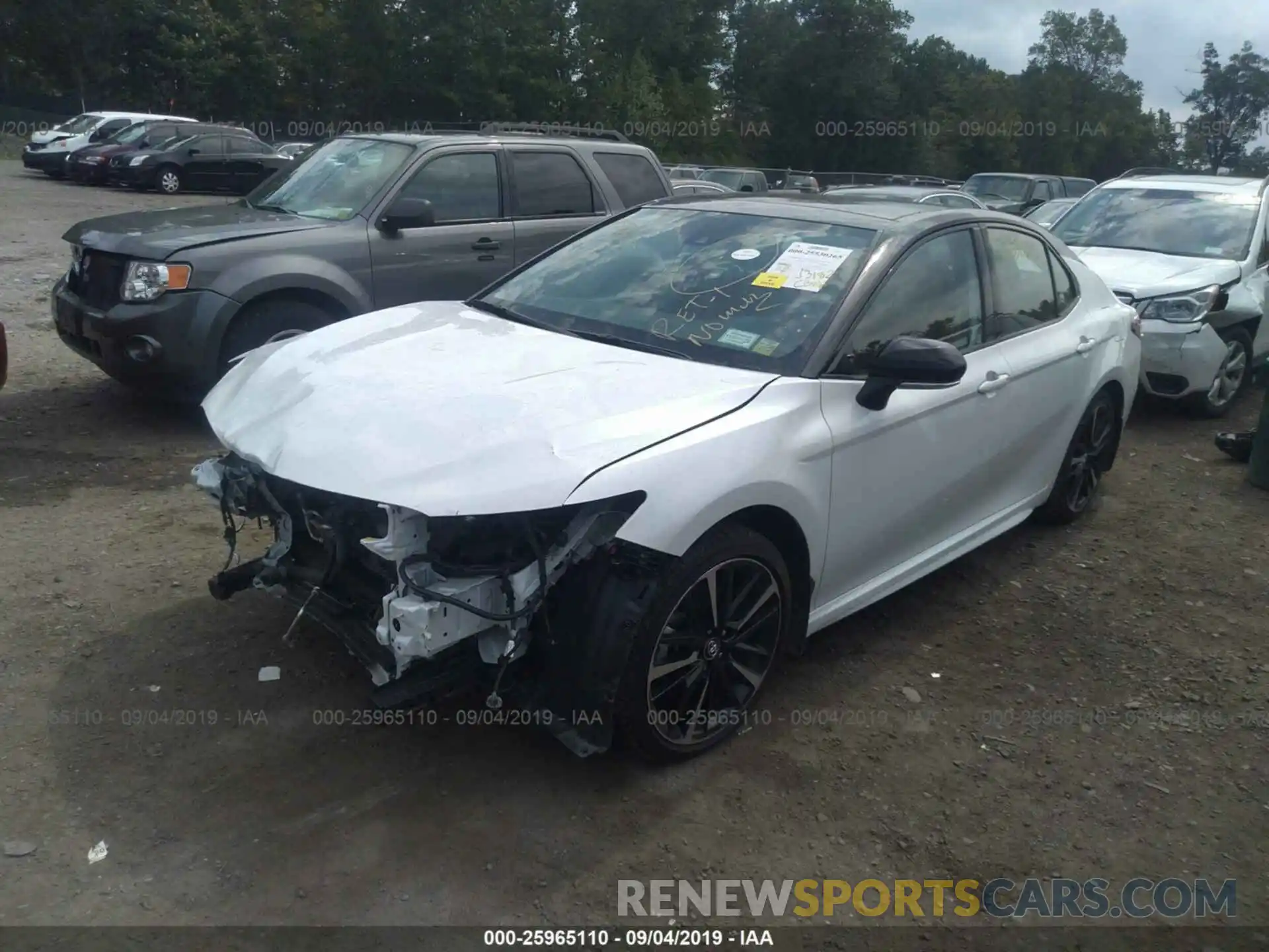 2 Photograph of a damaged car 4T1B61HK3KU163154 TOYOTA CAMRY 2019