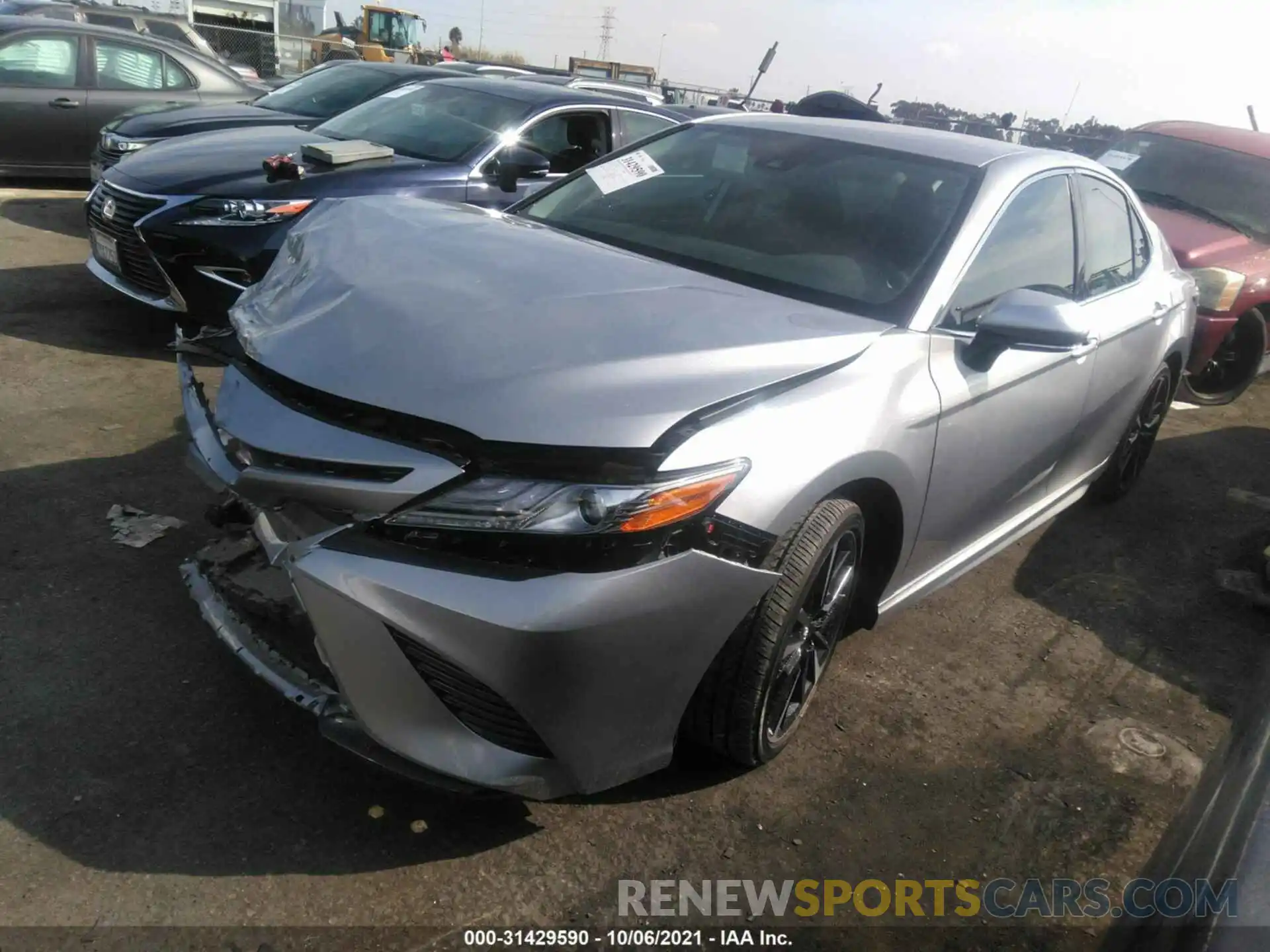 2 Photograph of a damaged car 4T1B61HK3KU164952 TOYOTA CAMRY 2019