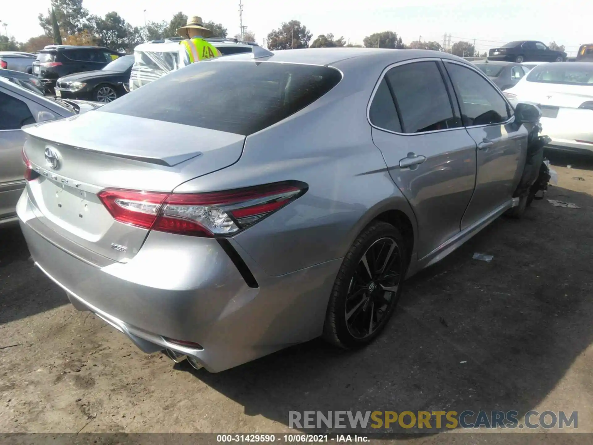 4 Photograph of a damaged car 4T1B61HK3KU164952 TOYOTA CAMRY 2019