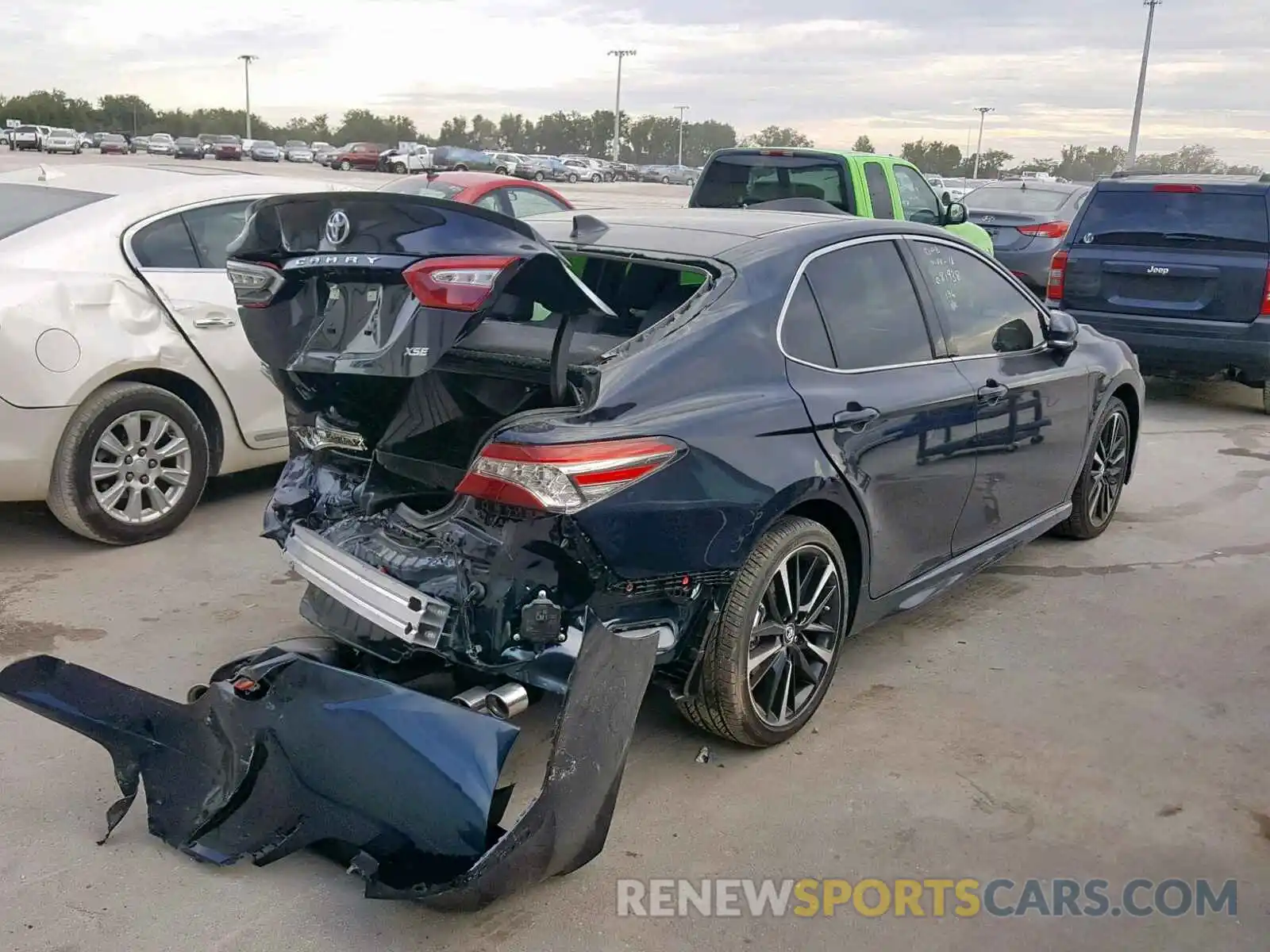 4 Photograph of a damaged car 4T1B61HK3KU687453 TOYOTA CAMRY 2019