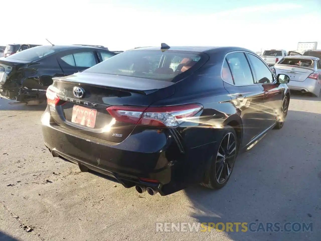 4 Photograph of a damaged car 4T1B61HK3KU711685 TOYOTA CAMRY 2019