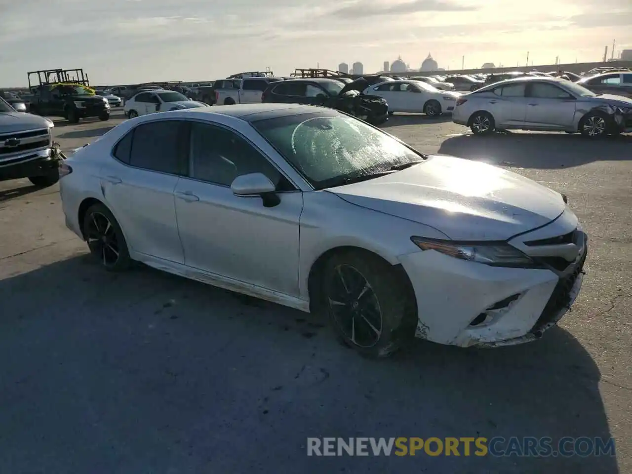 4 Photograph of a damaged car 4T1B61HK3KU752351 TOYOTA CAMRY 2019