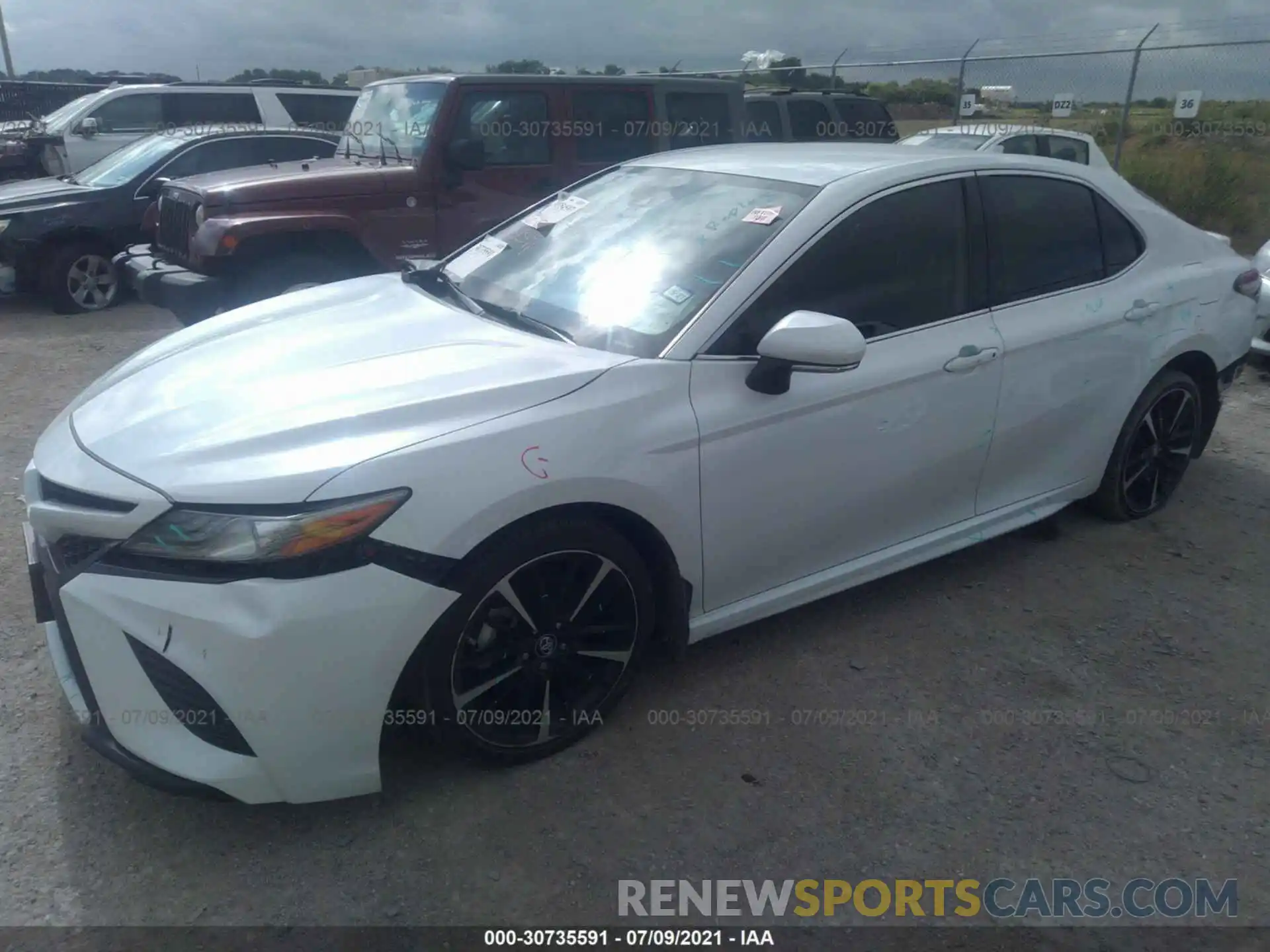 2 Photograph of a damaged car 4T1B61HK3KU760224 TOYOTA CAMRY 2019