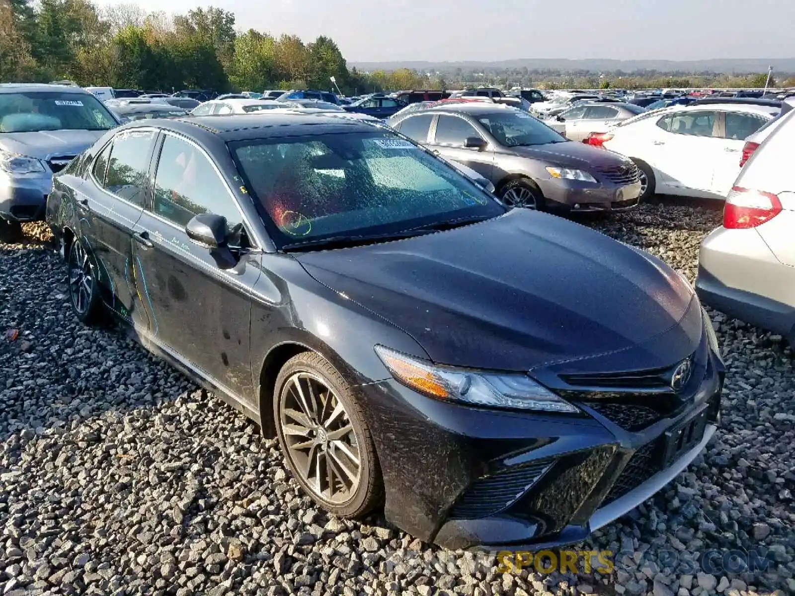 1 Photograph of a damaged car 4T1B61HK3KU786953 TOYOTA CAMRY 2019