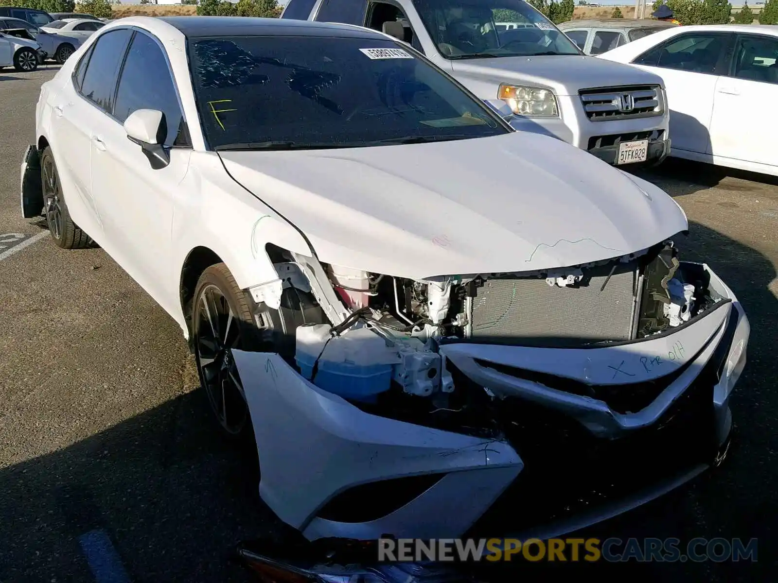 1 Photograph of a damaged car 4T1B61HK3KU788847 TOYOTA CAMRY 2019