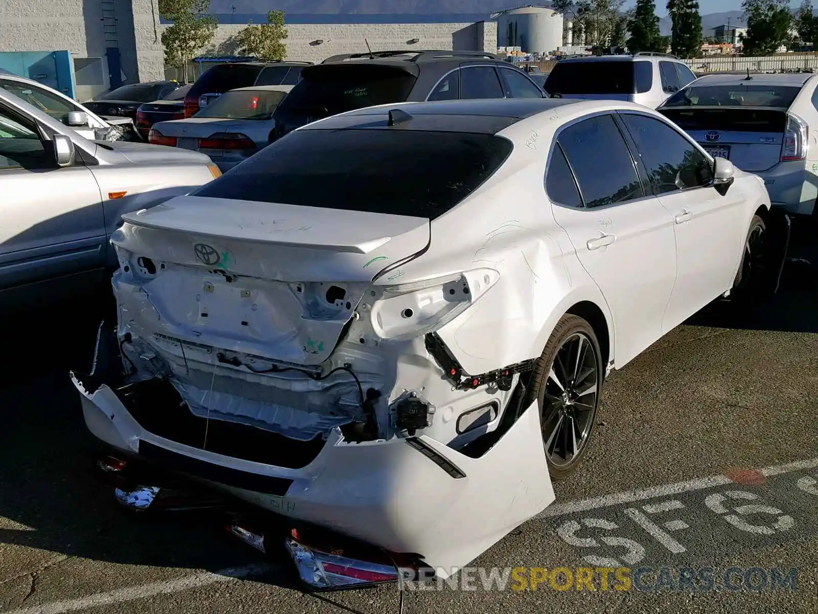 4 Photograph of a damaged car 4T1B61HK3KU788847 TOYOTA CAMRY 2019