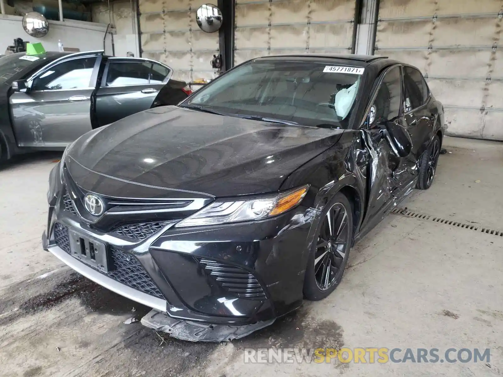 2 Photograph of a damaged car 4T1B61HK3KU798875 TOYOTA CAMRY 2019