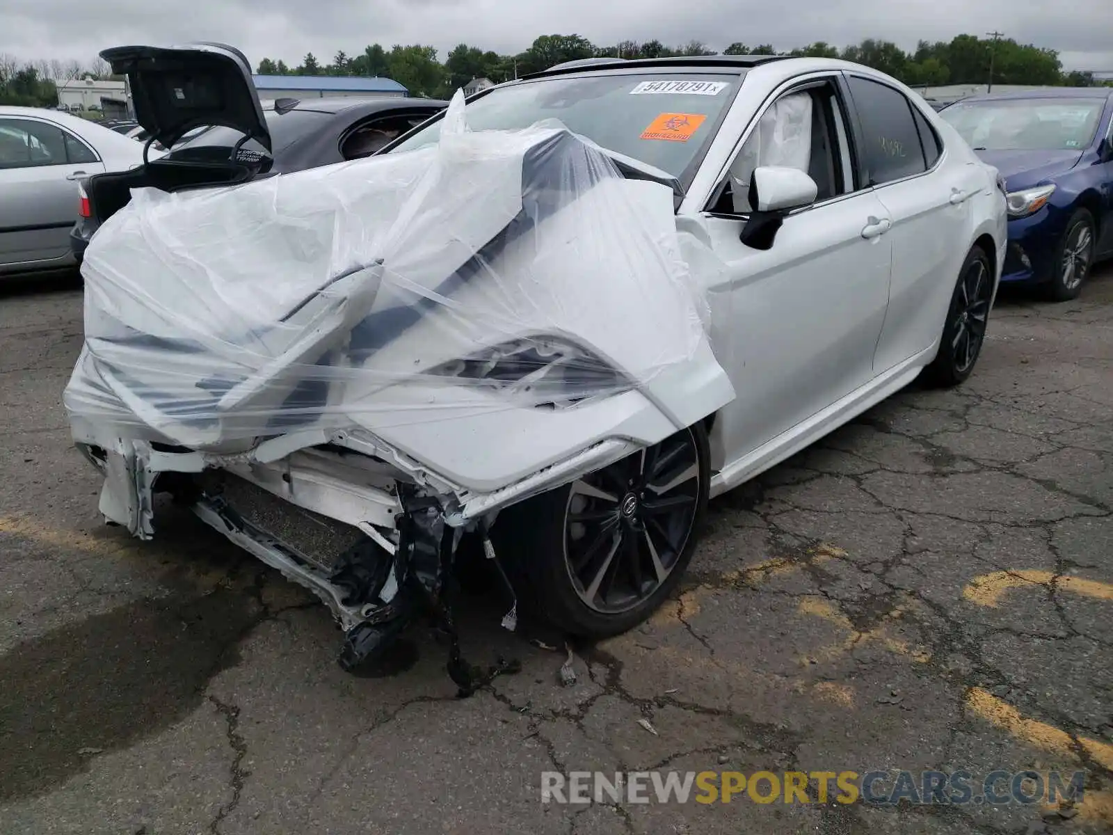 2 Photograph of a damaged car 4T1B61HK3KU821930 TOYOTA CAMRY 2019