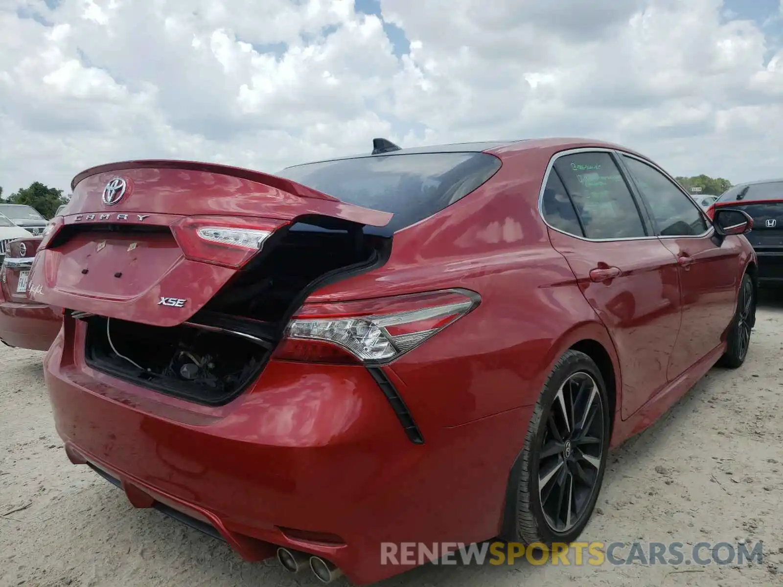 4 Photograph of a damaged car 4T1B61HK4KU205993 TOYOTA CAMRY 2019