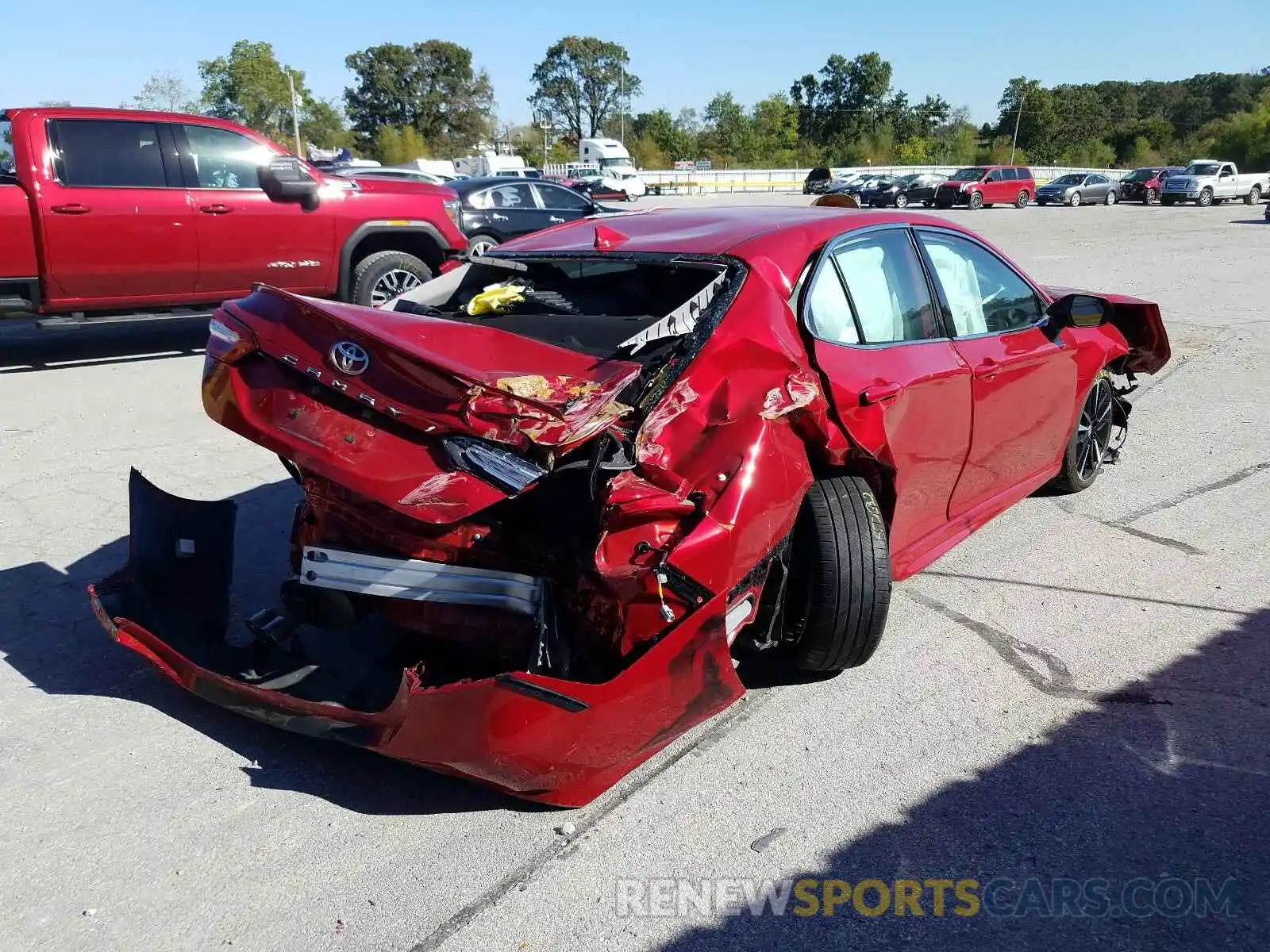 4 Photograph of a damaged car 4T1B61HK4KU221661 TOYOTA CAMRY 2019