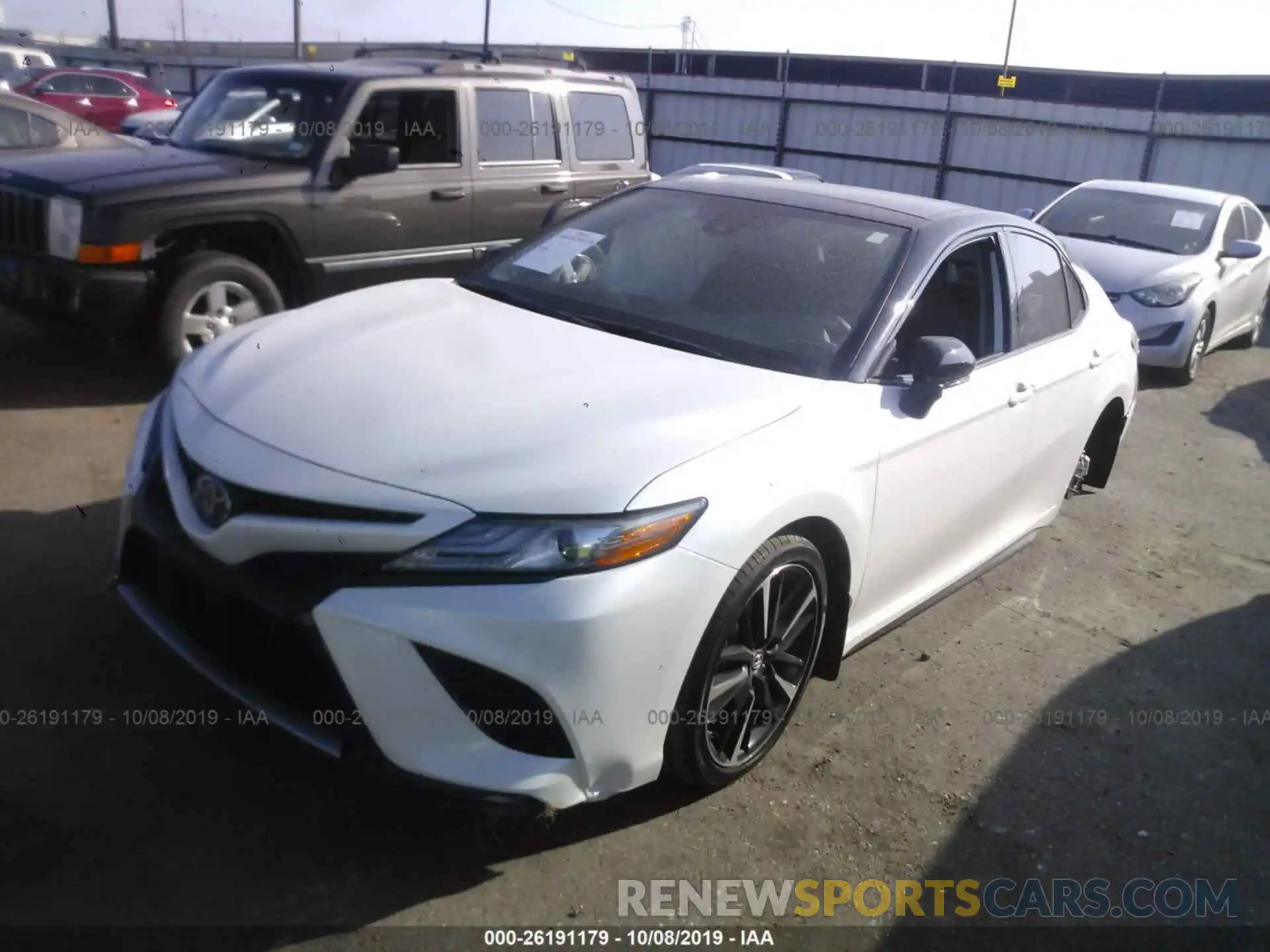 2 Photograph of a damaged car 4T1B61HK4KU274554 TOYOTA CAMRY 2019