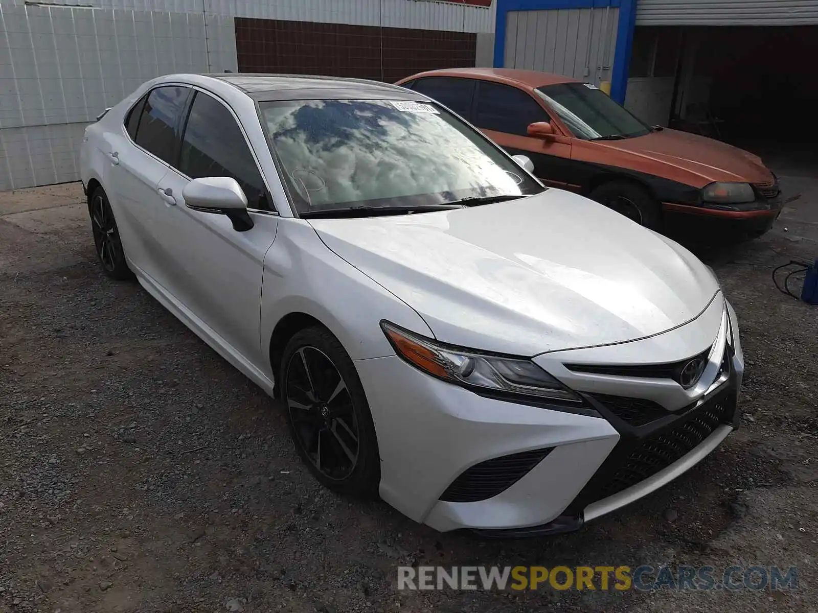 1 Photograph of a damaged car 4T1B61HK4KU749975 TOYOTA CAMRY 2019