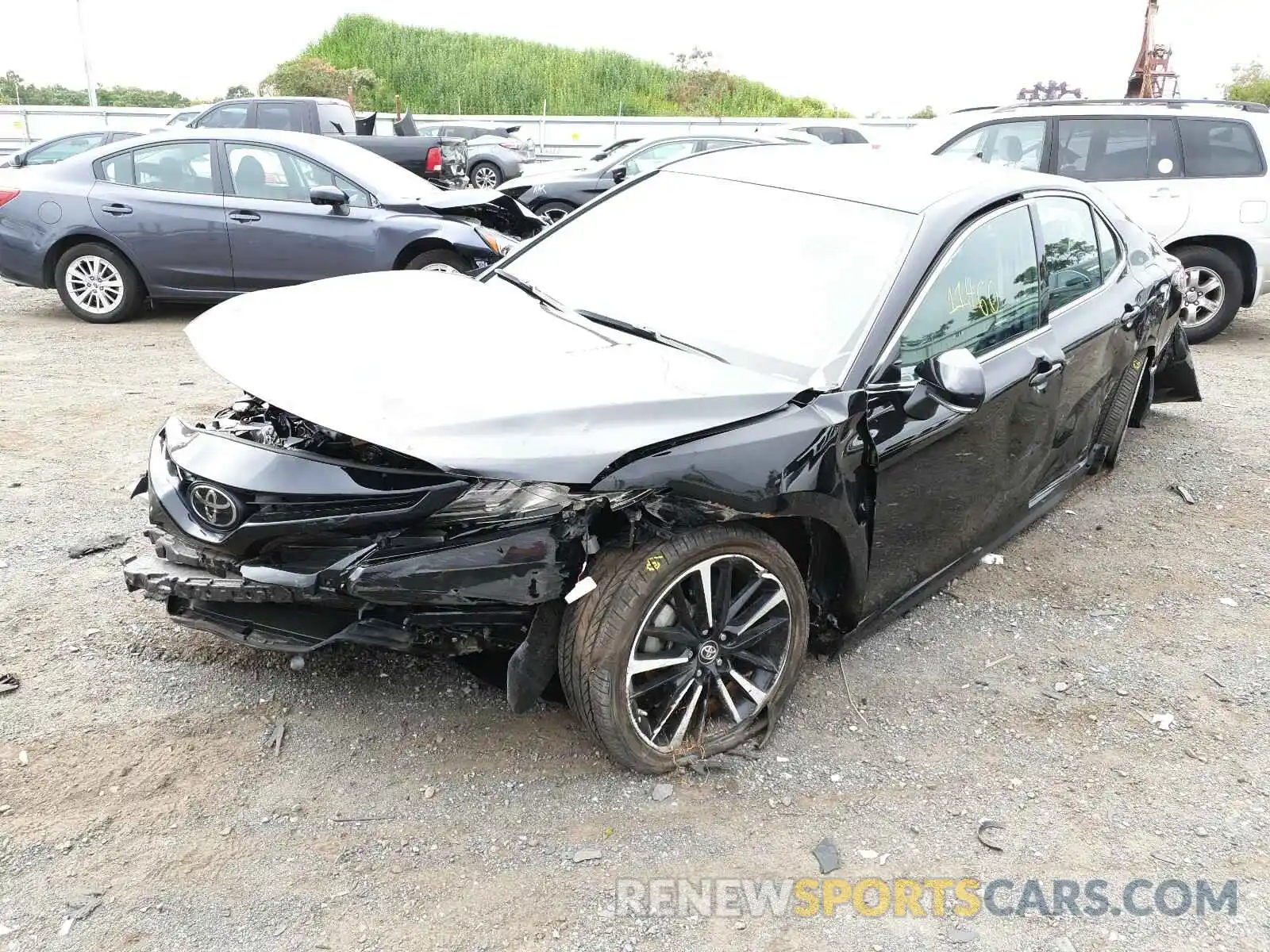 2 Photograph of a damaged car 4T1B61HK4KU770986 TOYOTA CAMRY 2019