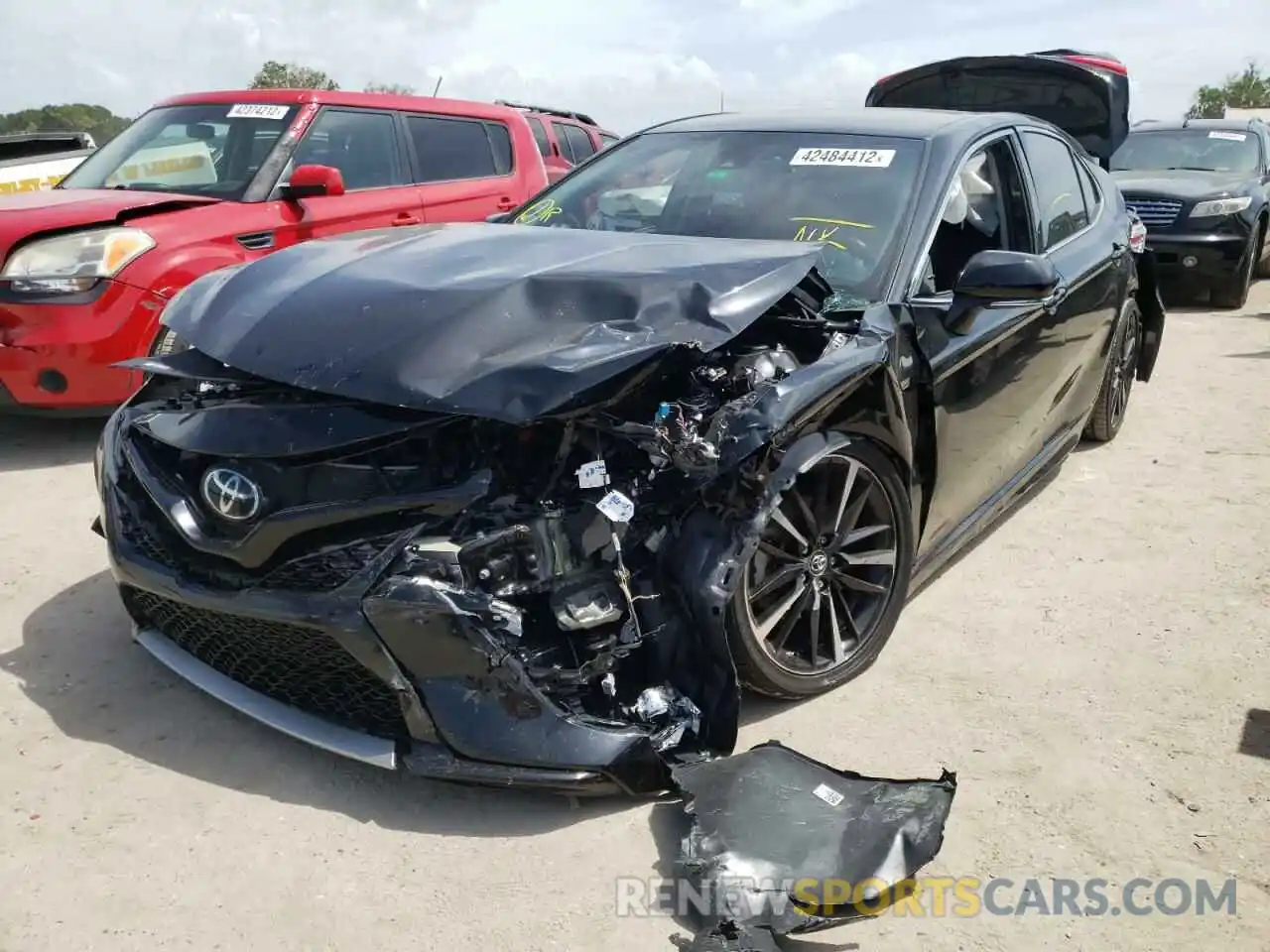 2 Photograph of a damaged car 4T1B61HK4KU784595 TOYOTA CAMRY 2019