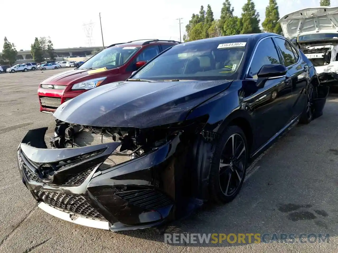 2 Photograph of a damaged car 4T1B61HK4KU836713 TOYOTA CAMRY 2019