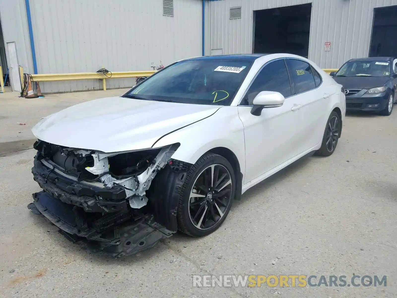 2 Photograph of a damaged car 4T1B61HK4KU843208 TOYOTA CAMRY 2019