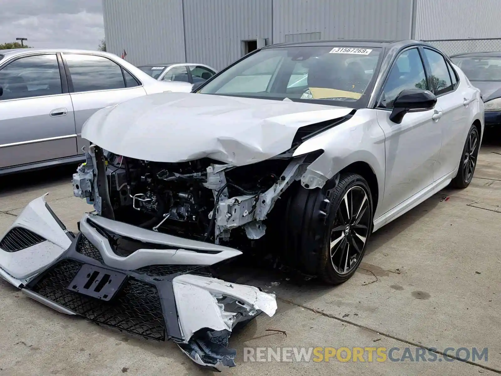 2 Photograph of a damaged car 4T1B61HK5KU180960 TOYOTA CAMRY 2019