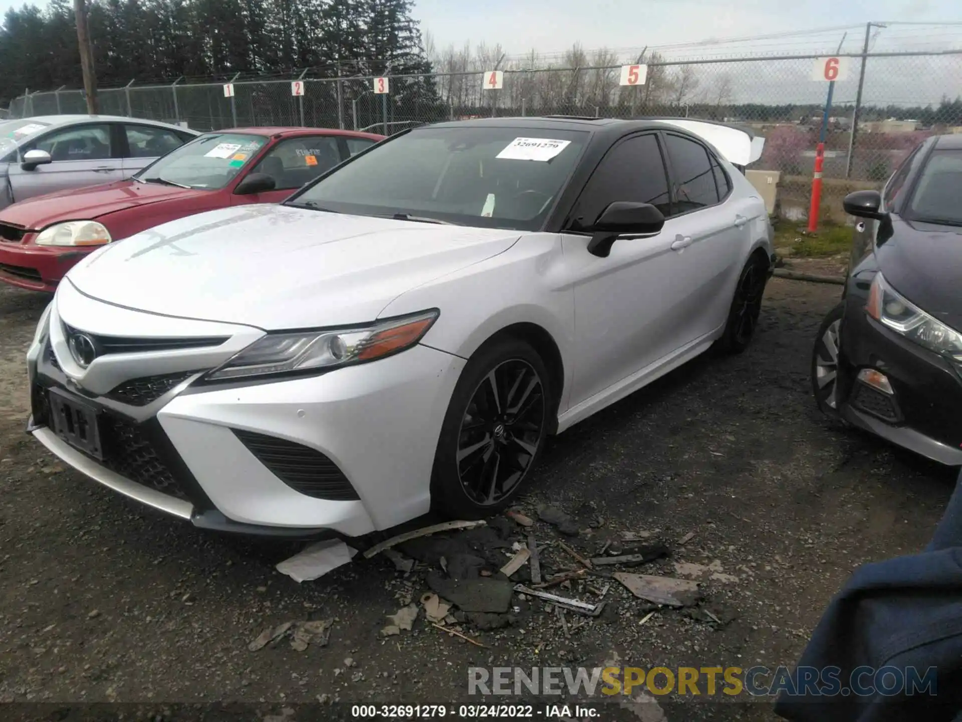 2 Photograph of a damaged car 4T1B61HK5KU209325 TOYOTA CAMRY 2019